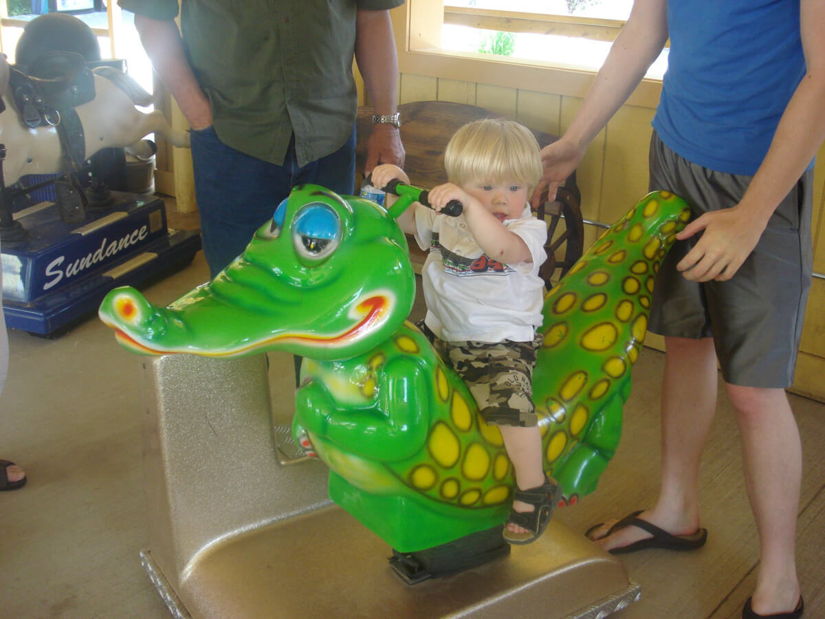 Joshua riding alligator