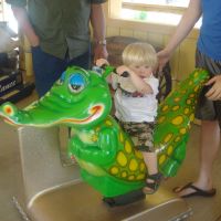 Joshua riding alligator