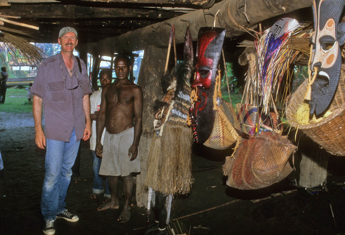 Image of a Reptile Gardens employee with authentic Tribal Art in Papua New Guinea..